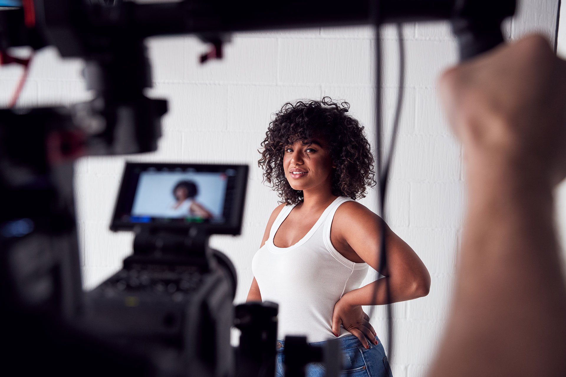 female-model-posing-for-video-camera-on-film-set-2021-08-26-16-14-45-utc.jpg